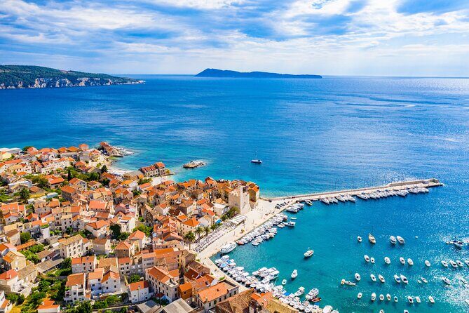 Blue Cave and Hvar 5 Islands Tour from Split - Komiža: breakfast-style break and old Dalmatian fishing-town feel