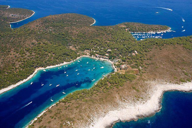 Blue Cave and Pakleni Islands group Tour from Hvar - Stiniva Bay: the European beach effect, with swim access and a bar