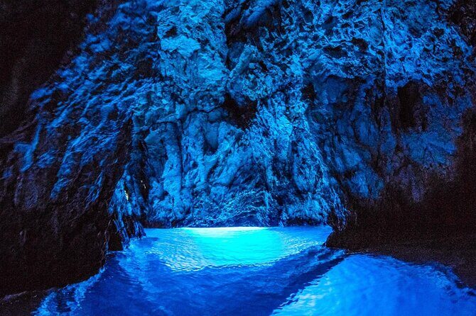 Blue cave group tour with swimming and snorkelling from Hvar - Stiniva Cove: cliffs, color, and a beach you remember later