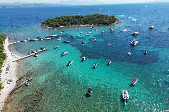 Blue Lagoon Tour from Split with Bottled Water and Wine Included - Stop 2: Krknjasi Bay Blue Lagoon for snorkeling and swimming