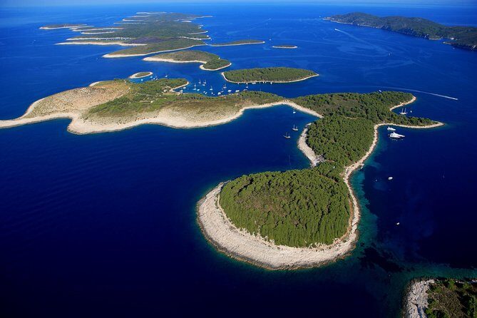 Exclusive Private Tour: Red Rocks & Pakleni Islands - Dubovica Beach: Quiet Swim, Pebbly Shore, and a Small Underwater Cave