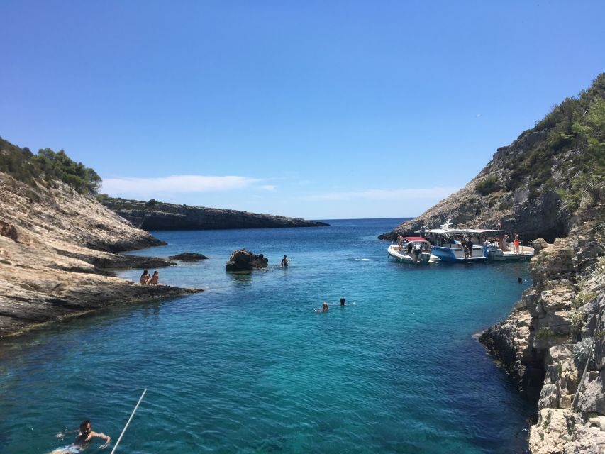 From Hvar: Blue Cave, Green Cave & 5 Islands Speedboat Tour - Stiniva Cove on Vis: swim time, shore photos, and a jellyfish warning