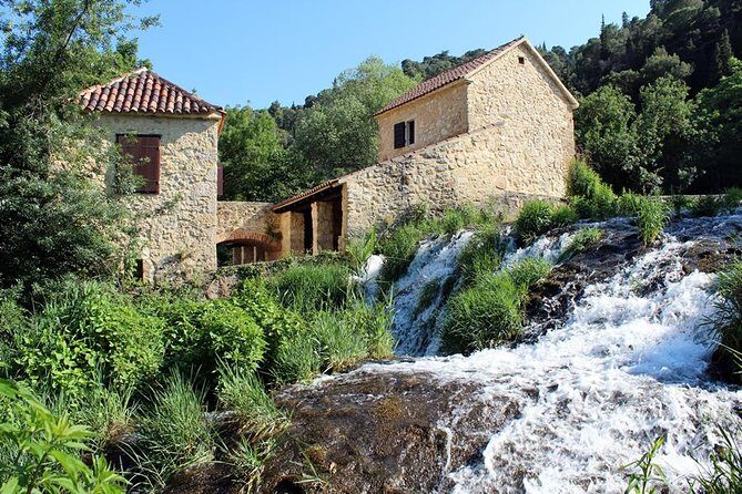 From Split or Trogir: Krka Waterfalls & Primošten Sightseeing - Primošten stop: beaches, viewpoints, and that calm Adriatic mood
