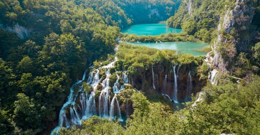 From Split or Trogir: Plitvice Lakes Guided Full-Day Tour - Wooden Walkways: The Colors and the Waterfall Rhythm