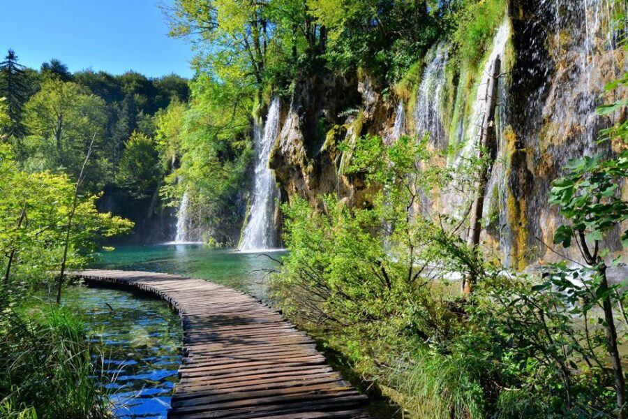 From Split: Plitvice Lakes Fully-Guided Day Tour - Lower Lakes boat ride: the fairytale perspective shift
