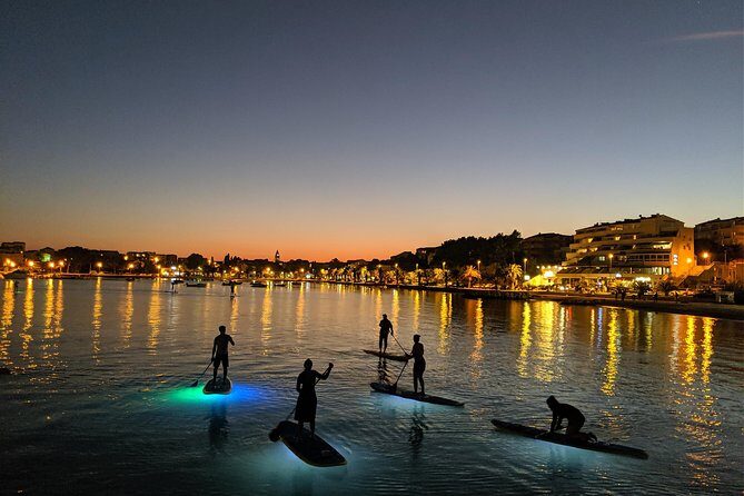 Glowing Stand-Up Paddle Experience in Split - Back to the sea: Stobreč white rocks, cliffs, and traditional houses