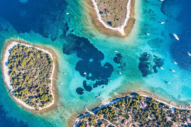 Half Day Tour: Blue Lagoon, UNESCO Town of Trogir, island Ciovo - Blue Lagoon and Krknjaši Bay: real swim time, plus crowded-water reality