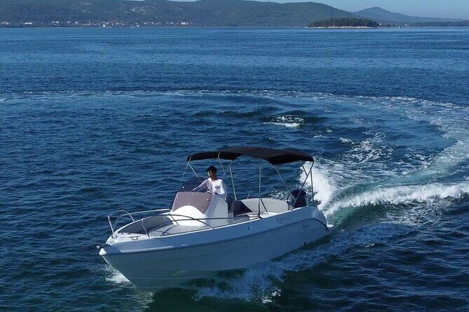 Magic Private Boat Tour from Split - Blue Lagoon / Krknjasi Bay: Snorkels, Swims, and Dolphin Reality