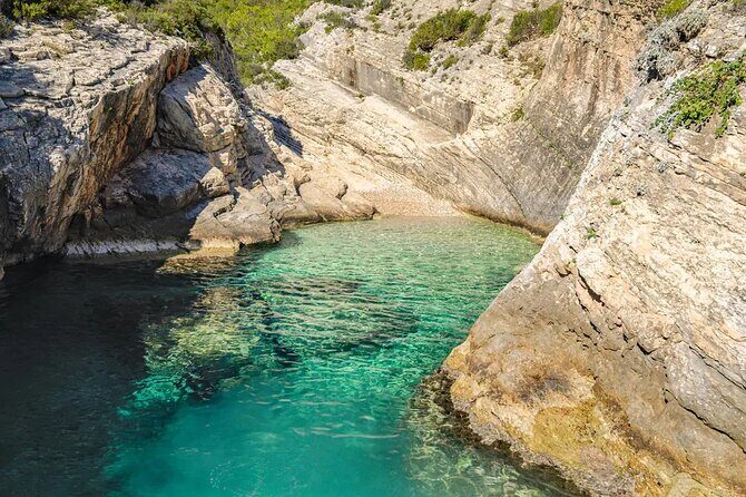 Private Boat Tour from Hvar - Blue and Green cave, Vis, and the Pakleni islands - Stiniva Cove on Vis: The Cliff-Built Beach Stop