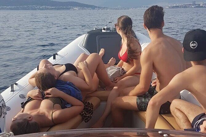 Private Full-Day Boat Tour to Blue Lagoon, Hvar & Pakleni Islands - On-board comfort: towels, water, paddleboards, and the spray reality
