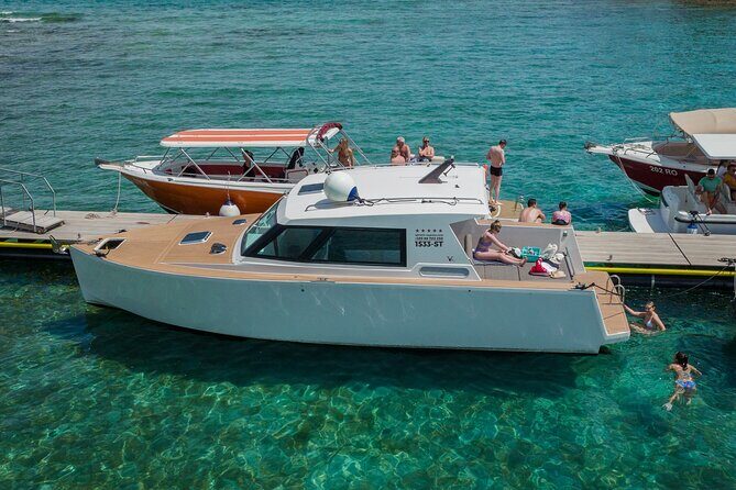 Private Red Rocks and Pakleni Islands beach hopping speedboat tour - Stop 4: Mlini Beach for a final turquoise swim