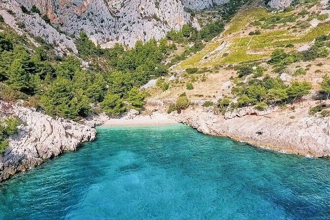 Private Tour of Red rocks, Pakleni Islands and Hvar's Southern Beaches - Red Rocks: where red cliffs meet sea-level caves