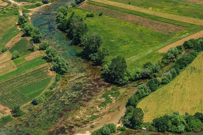 Sinj: Panoramic Flight over Peruca Lake and Dinara mountain - The “Looks Bottomless” Spring Lake: When Light Helps the View