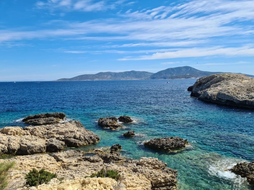 Split: Bisevo, Vis, and Hvar Boat Tour with Snorkel Stops - Komiza on Vis: coffee in a small harbor town before the sea swim
