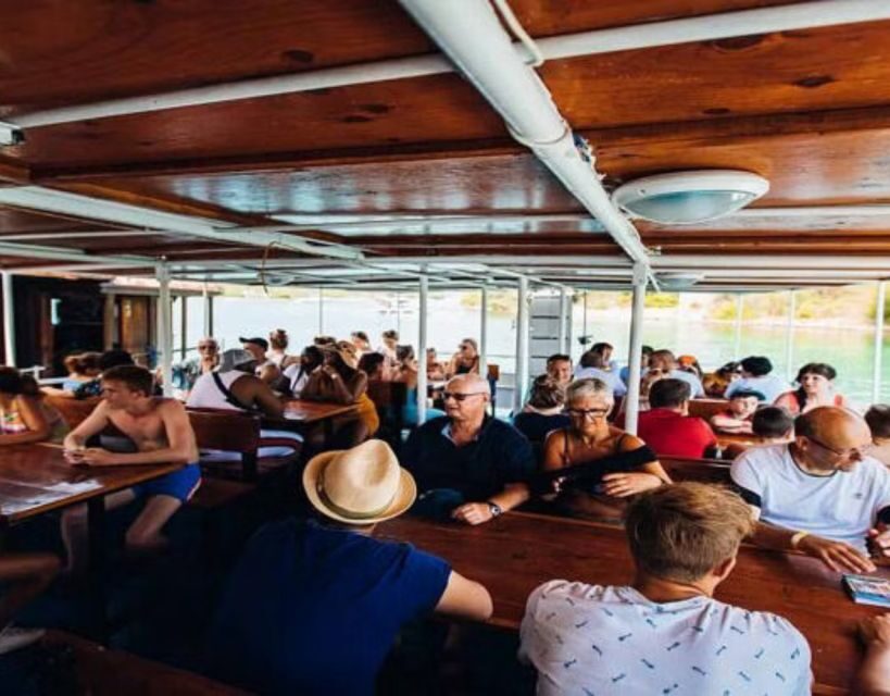 Split: Blue Lagoon Boat Trip with Lunch, Wine and Snorkeling - Food, Wine, and Music on Deck: The Floating Lunch Break