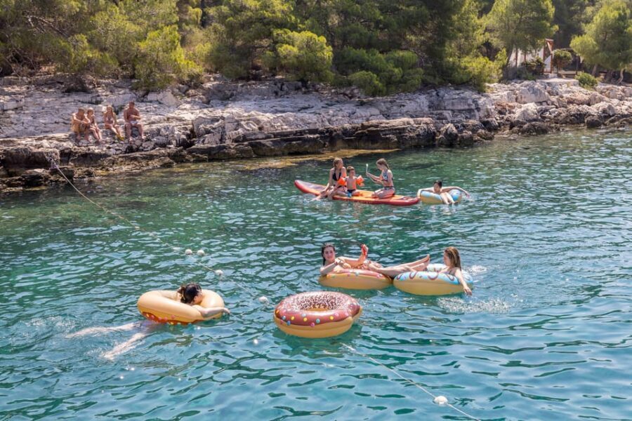 Split: Hvar, Brač, and Pakleni Cruise with Lunch and Drinks - Food and Drinks on Board: Doughnuts, Burgers, Fries, and Wine