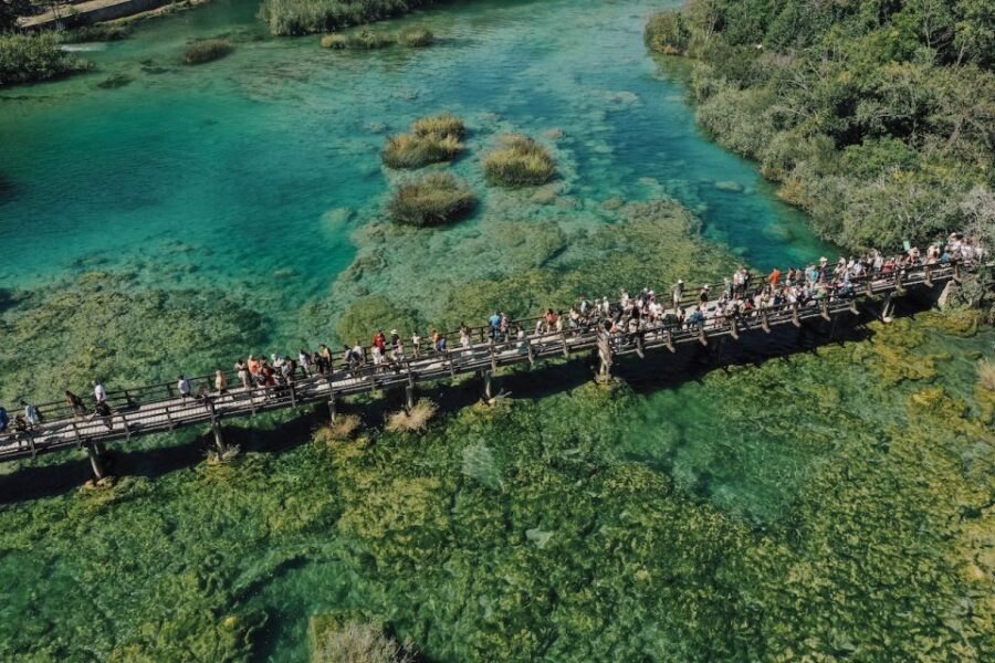 Split: Krka Waterfalls Tour, Boat Cruise, and Swimming - Skradin Free Time: Lunch, Fortress Views, and Beach Swimming